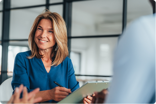 woman at desk going over payroll readiness checklist